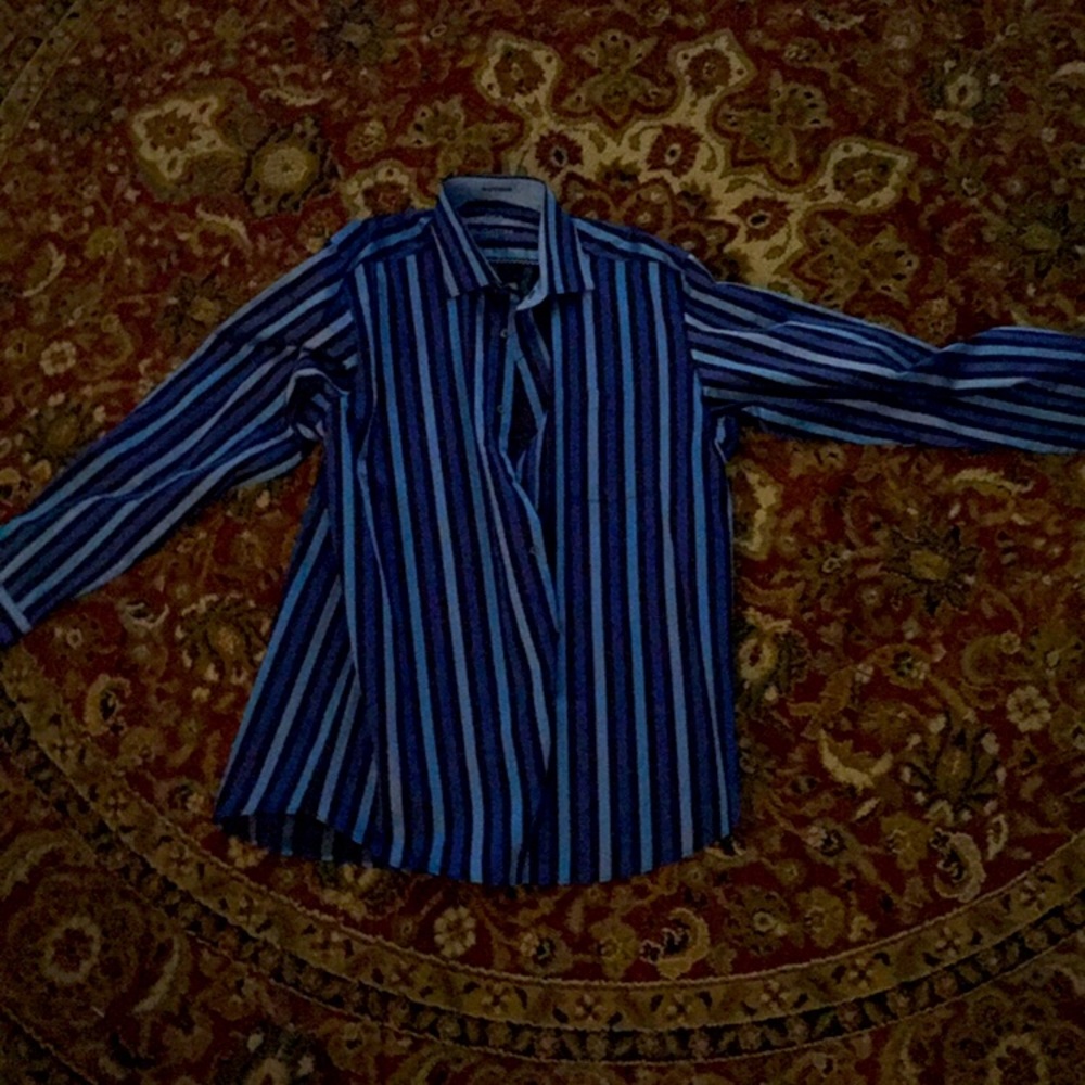 A mens button up t-shirt.